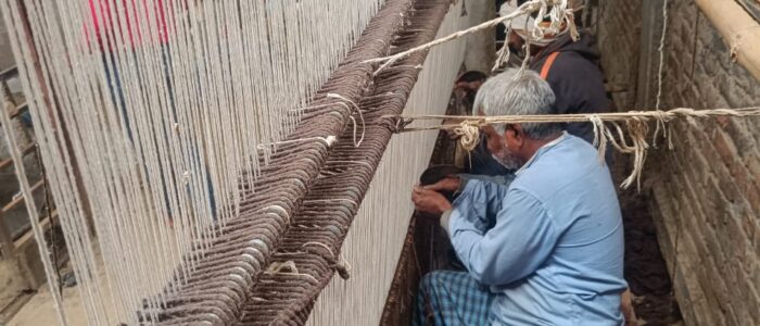 Carpet weaving process by rural Indian artisans
