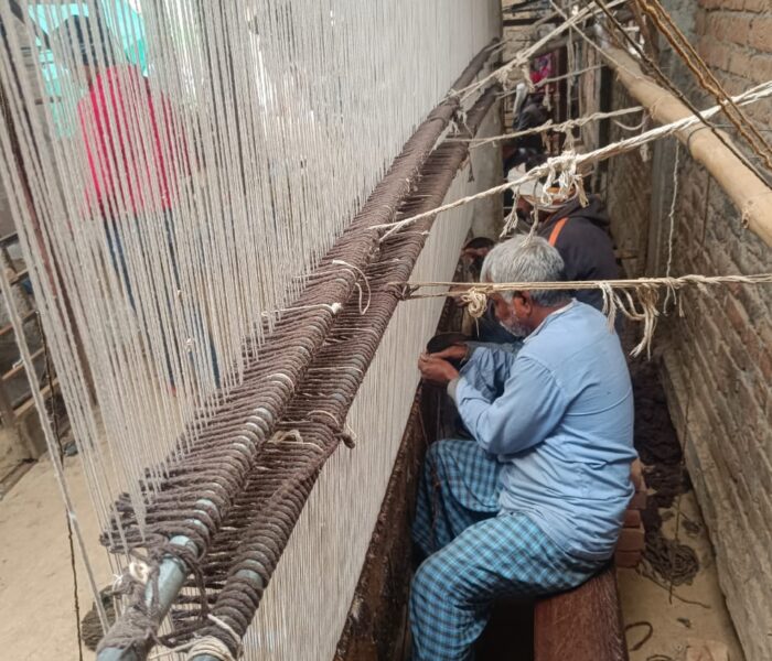 Carpet weaving process by rural Indian artisans